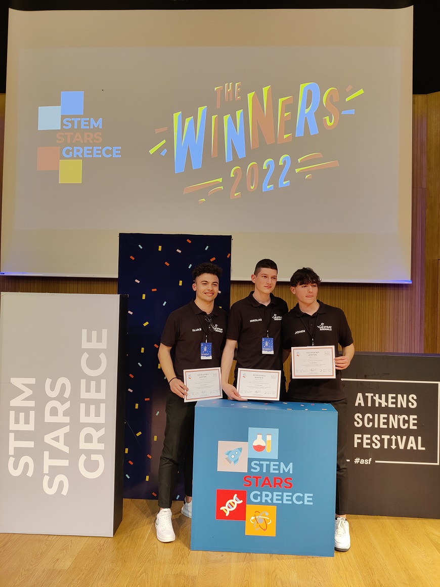 Three people posing with their certificate in the STEM Stars Greece Conference